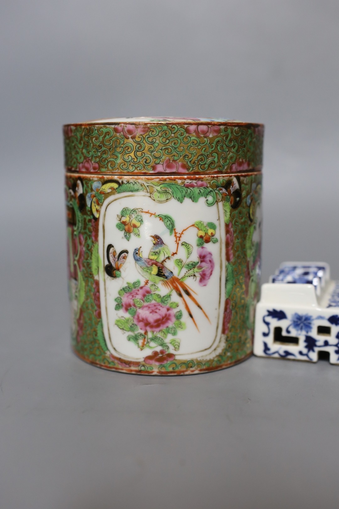 A Chinese Canton famille rose jar and cover and a Chinese blue and white brush stand